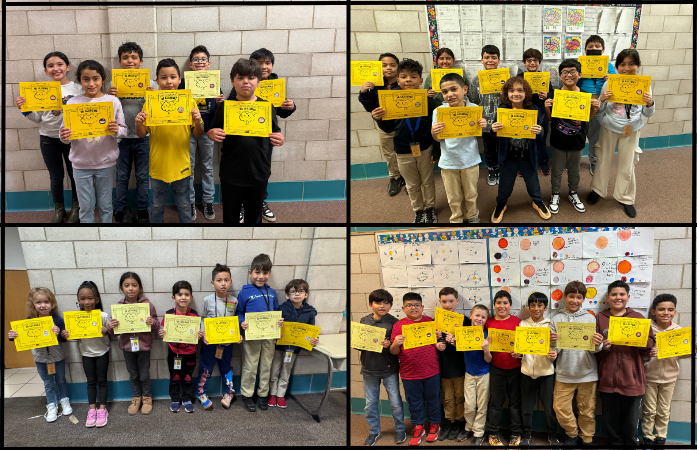 students posing in the hallway holding their certificates